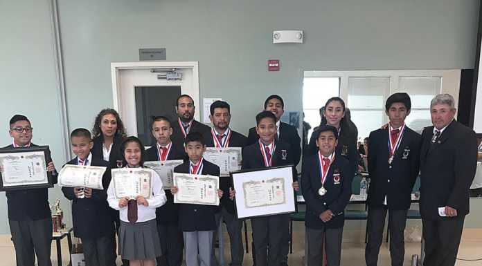 Young martial artists earn black belts