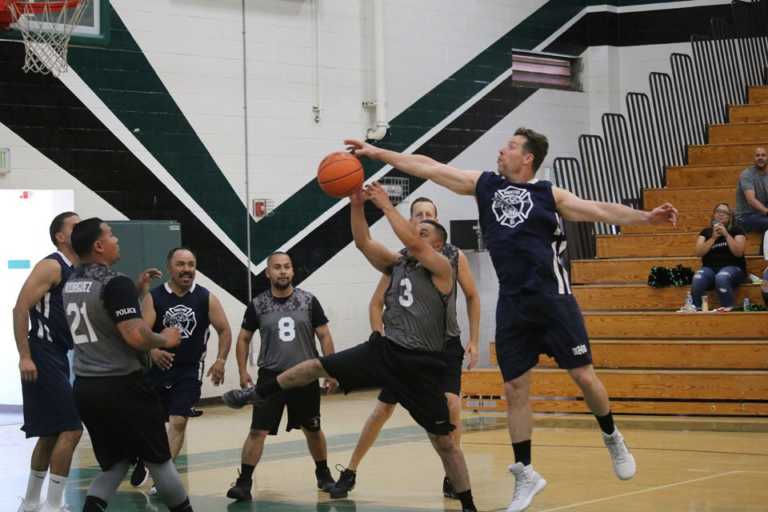 Greenfield Fire defeats Police in basketball