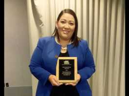 Martinez receives library award