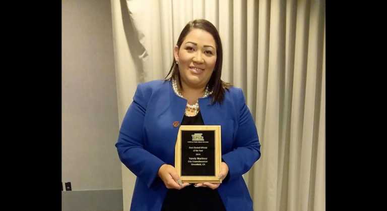 Martinez receives library award