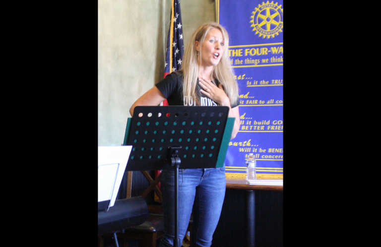 Kaatia Larsen sings along with special guests at Soledad Rotary meeting