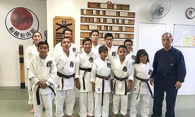 Local karate students earn black belts