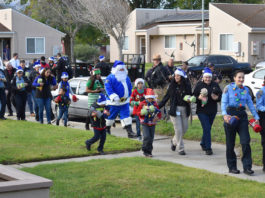 Operation Blue Santa delivers hundreds of gifts throughout Greenfield community