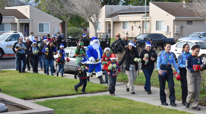Operation Blue Santa delivers hundreds of gifts throughout Greenfield community