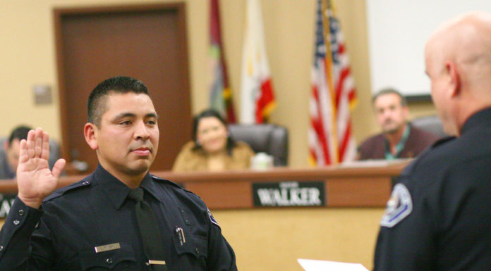 Greenfield welcomes new police officer at swearing-in ceremony